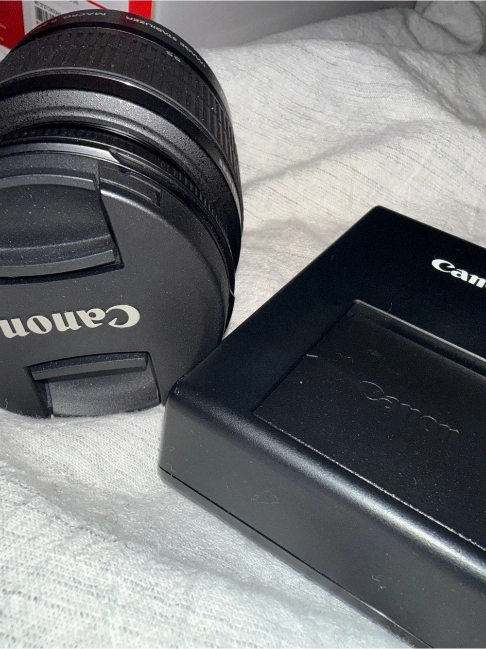 Canon DSLR Camera in Black with Red Strap Accent